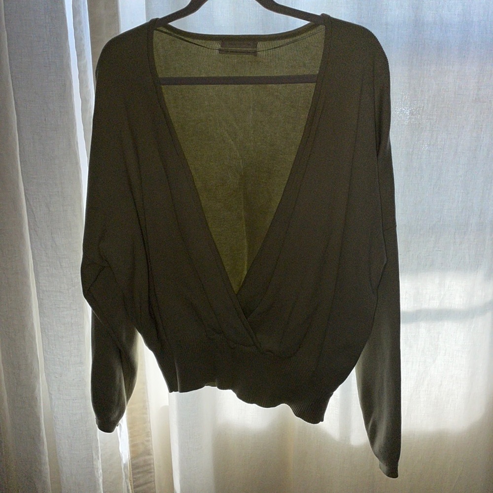 Surplice low waist long sleeved green sweater from  Urban Outfitters